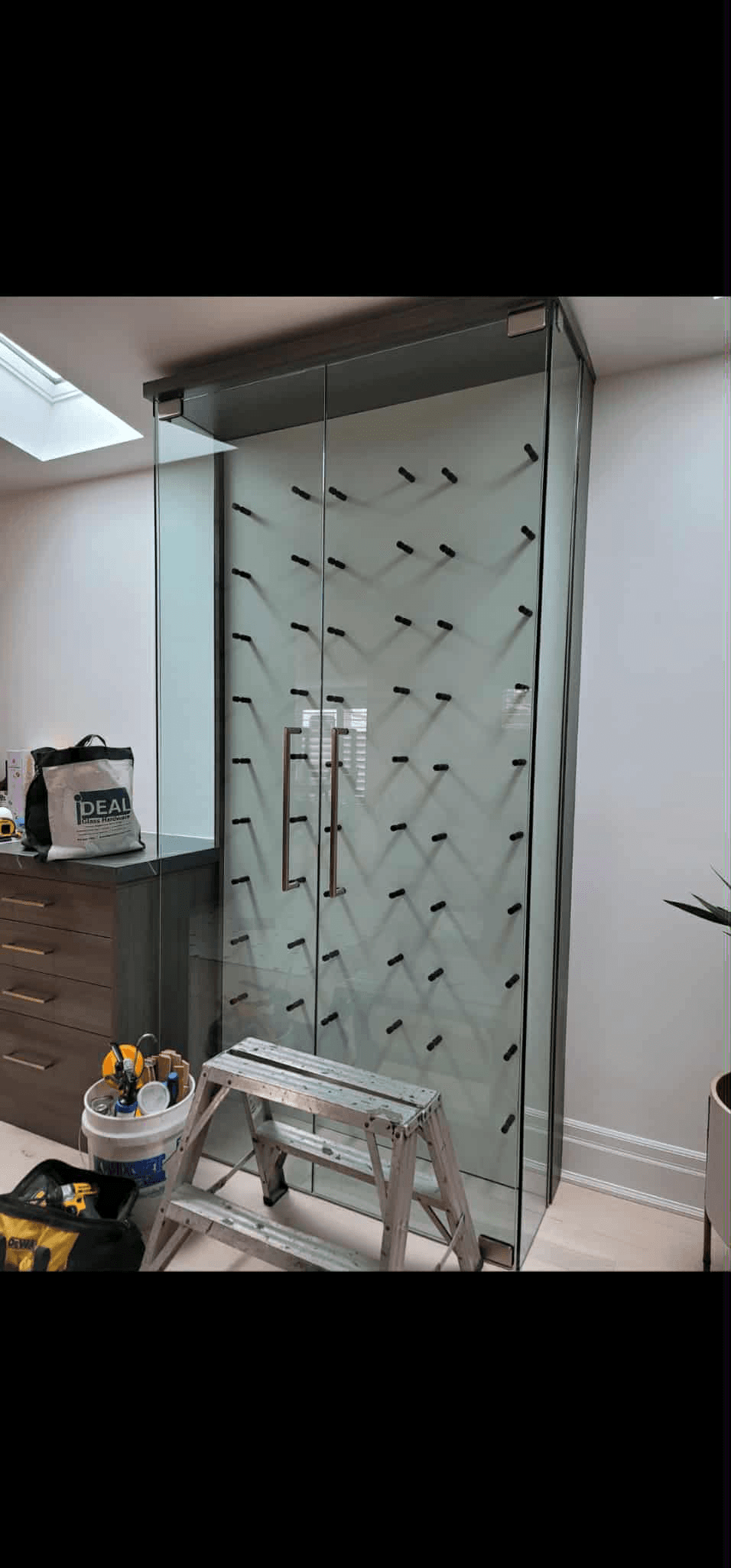 Pinboard wall with glass doors