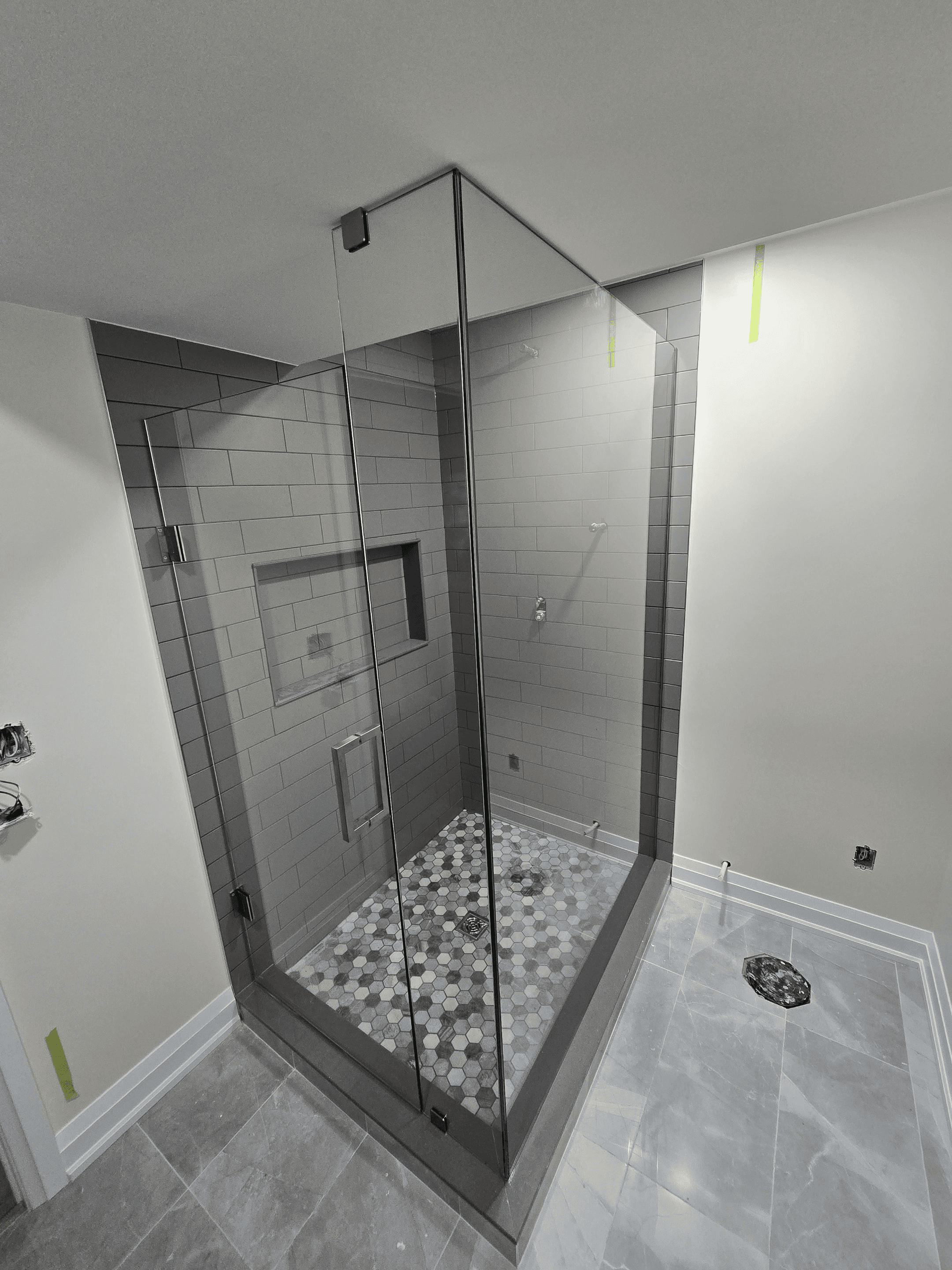 Corner stone and glass shower