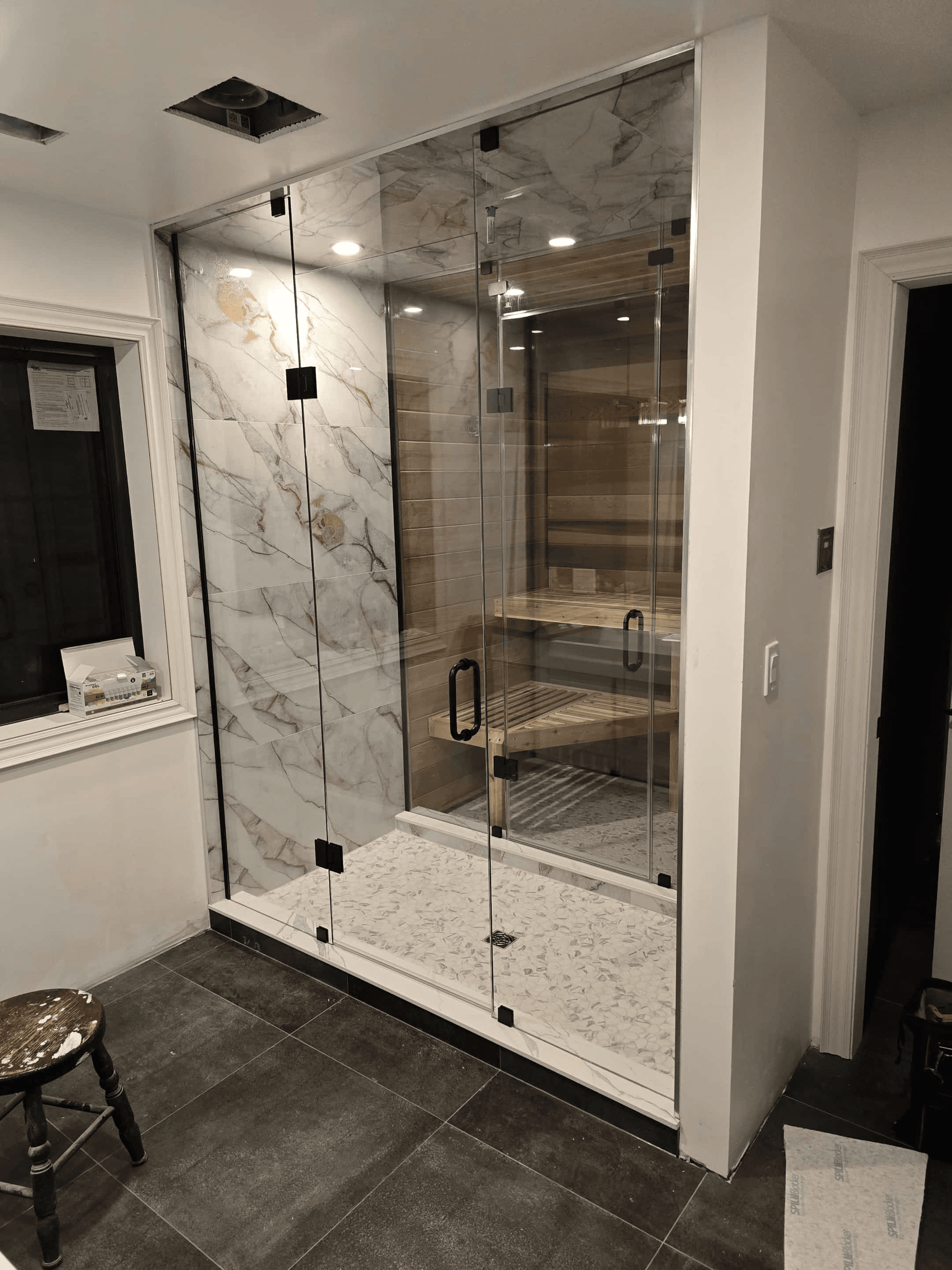 Glass shower accessible from both sides